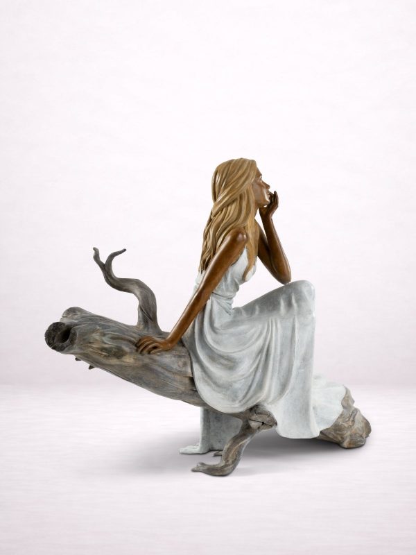 lilas sculpture en bronze femme assise branche robe longue